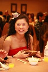 Matchmaker Extraordinaire Hellen Chen joins in the celebration of another newly wed